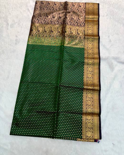 Banarasi Katan Saree with Tanchoi Buttis in DarkGreen with Purple